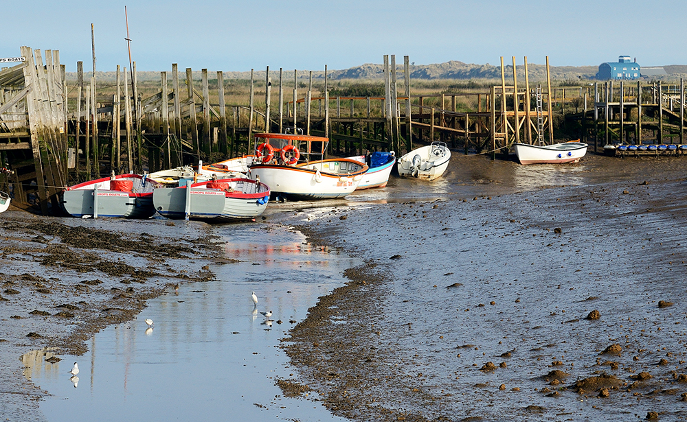 Bishop's Boats in the creek at low water morston s